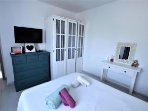 Postel nebo postele na pokoji v ubytování Apartament Gina a 3 kms d Lloret de mar