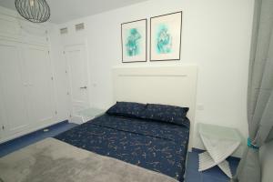 Posteľ alebo postele v izbe v ubytovaní Xposure beach apartment