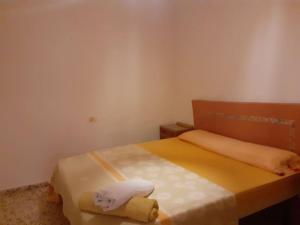 Łóżko lub łóżka w pokoju w obiekcie Casa de Campo en Playa Dosel 2