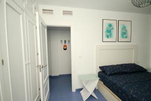 Posteľ alebo postele v izbe v ubytovaní Xposure beach apartment