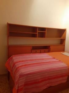 Łóżko lub łóżka w pokoju w obiekcie Casa de Campo en Playa Dosel 2