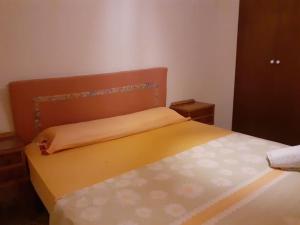 Łóżko lub łóżka w pokoju w obiekcie Casa de Campo en Playa Dosel 2