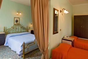 Voodi või voodid majutusasutuse Albergo Bellavista toas
