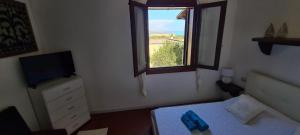 Cama ou camas em um quarto em Casa La Pelosa