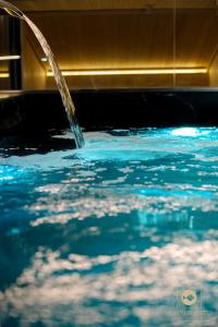 a close up of a pool of water at Castelar Palace & SPA by Seaward Suites in Villajoyosa +13 photos