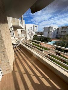 a view of a balcony of a building at appartement résidence Palm Beach Saidia in Oujda