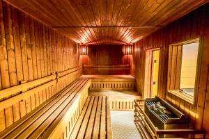 an inside view of a wooden sauna at Penzión Ľadoveň SKVELÁ KUCHYŇA A RODINNÁ ATMOSFÉRA in Martin
