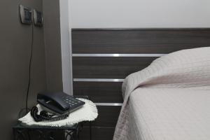 Postel nebo postele na pokoji v ubytování Hotel Residence Aurora + 37 fotografií
