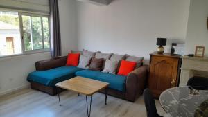 Posezení v ubytování Appartement lumineux et central