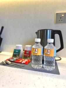 Příslušenství pro přípravu čaje a kávy v ubytování ISA Hotel Amber Road