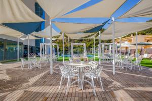 Um restaurante ou outro lugar para comer em Cullera Holiday