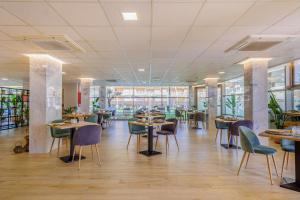 Um restaurante ou outro lugar para comer em Cullera Holiday