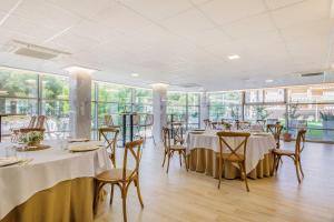Um restaurante ou outro lugar para comer em Cullera Holiday
