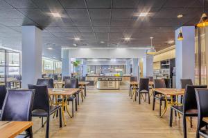 Um restaurante ou outro lugar para comer em Cullera Holiday