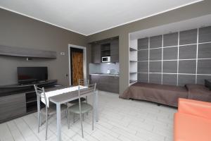 Kuchyň nebo kuchyňský kout v ubytování Hotel Residence Aurora