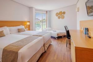 Cama ou camas em um quarto em Cullera Holiday