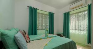 Postel nebo postele na pokoji v ubytování Chez Benoit Self Catering