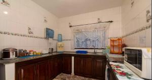 Kuchyň nebo kuchyňský kout v ubytování Chez Benoit Self Catering