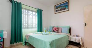 Postel nebo postele na pokoji v ubytování Chez Benoit Self Catering
