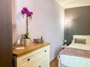 Apartament Deluxe tesisinde bir odada yatak veya yataklar