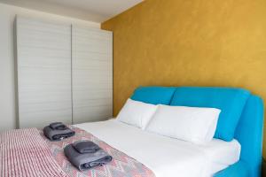 Postel nebo postele na pokoji v ubytování Villa De Alberti