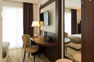 Postel nebo postele na pokoji v ubytování Hotel Schopenhauer Hof
