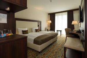 Postel nebo postele na pokoji v ubytování Hotel Schopenhauer Hof