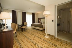 Postel nebo postele na pokoji v ubytování Hotel Schopenhauer Hof
