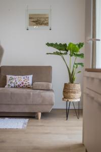 Ein Sitzbereich in der Unterkunft Apartment Dina