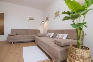 Ein Sitzbereich in der Unterkunft Apartment Dina