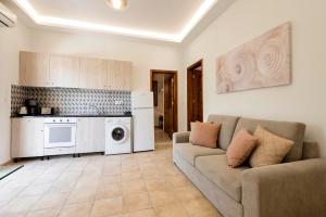 A kitchen or kitchenette at Ariadni Villas Faliraki