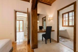A bed or beds in a room at Ariadni Villas Faliraki