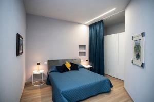 Postel nebo postele na pokoji v ubytování Hotel Delta