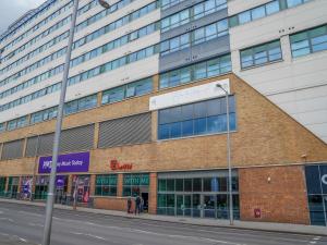 a building on the side of a street at Pass the Keys One Bed City Centre Apartment in Nottingham