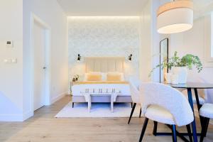 Posteľ alebo postele v izbe v ubytovaní Lofts Parque de Huelin
