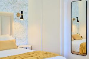 Posteľ alebo postele v izbe v ubytovaní Lofts Parque de Huelin