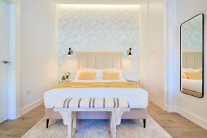Posteľ alebo postele v izbe v ubytovaní Lofts Parque de Huelin