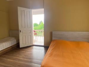 Letto o letti in una camera di Natia Guest House