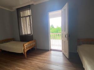 Letto o letti in una camera di Natia Guest House