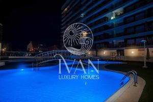 Bazén v ubytování Casa Indigo Ivan Luxury Homes 9ªPlta Sur 1ªLinea nebo v jeho okolí
