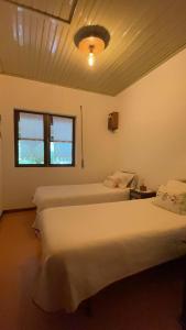 Katil atau katil-katil dalam bilik di Casa do Volfrâmio