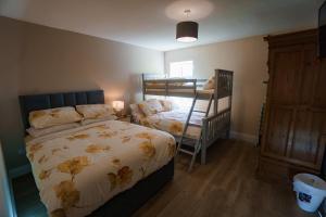 Letto o letti in una camera di Carrig Island Lodge