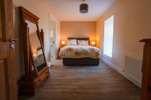 Letto o letti in una camera di Carrig Island Lodge