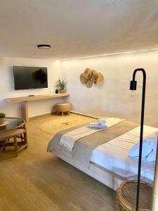 Posteľ alebo postele v izbe v ubytovaní Palma Beach House