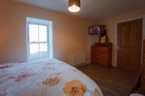 Letto o letti in una camera di Carrig Island Lodge