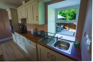 Cucina o angolo cottura di Carrig Island Lodge
