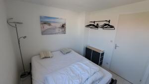 Posteľ alebo postele v izbe v ubytovaní Appartement 6 personnes les Sables d'Olonne