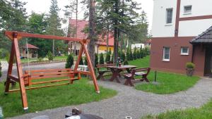 A área de jogos para crianças em Apartmani Borova Iglica Divčibare