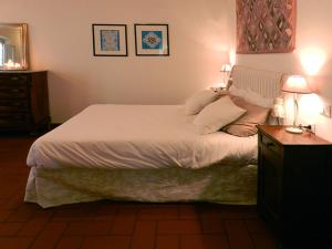 Postel nebo postele na pokoji v ubytování Agriturismo Gli Archi