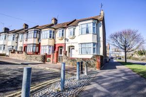 a large brick building on a city street at Pass the Keys Large house in heart of Southend in Southend-on-Sea